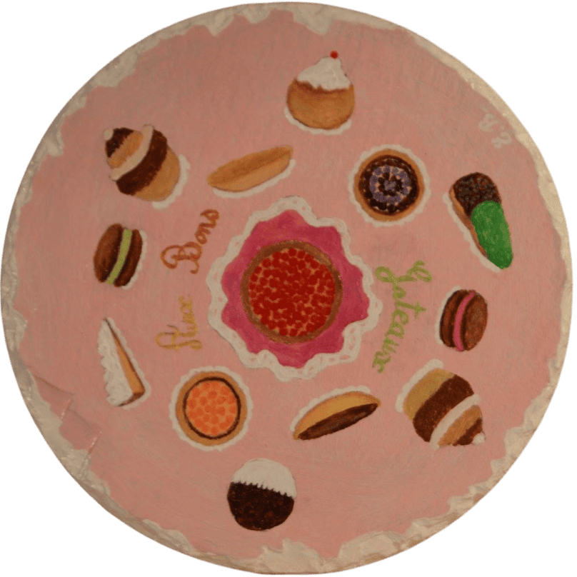 Peinture d'une ardoise de patisseries.